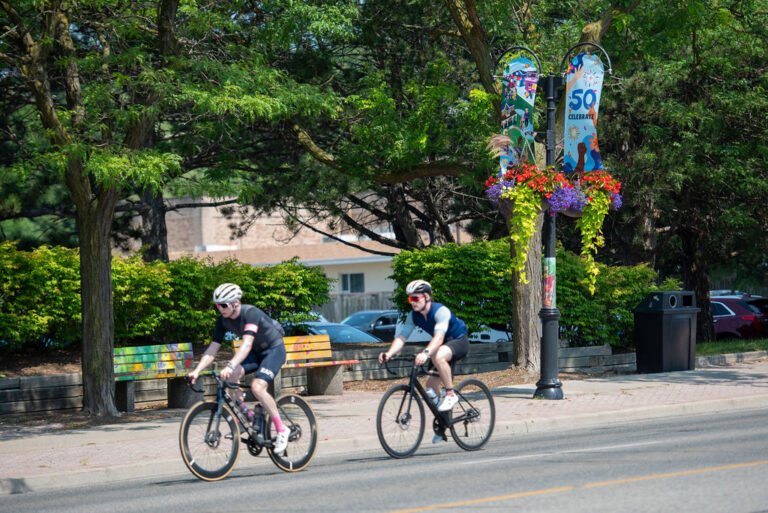 Two bicycles riding through Clarkson area